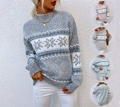 Woman wearing a blue Winter Snowflake Sweater with jacquard design, half turtleneck, and knit pattern against white background, shown also in pink, beige, and light blue colors.