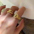 Gold adjustable belt buckle ring with zircon decoration on finger