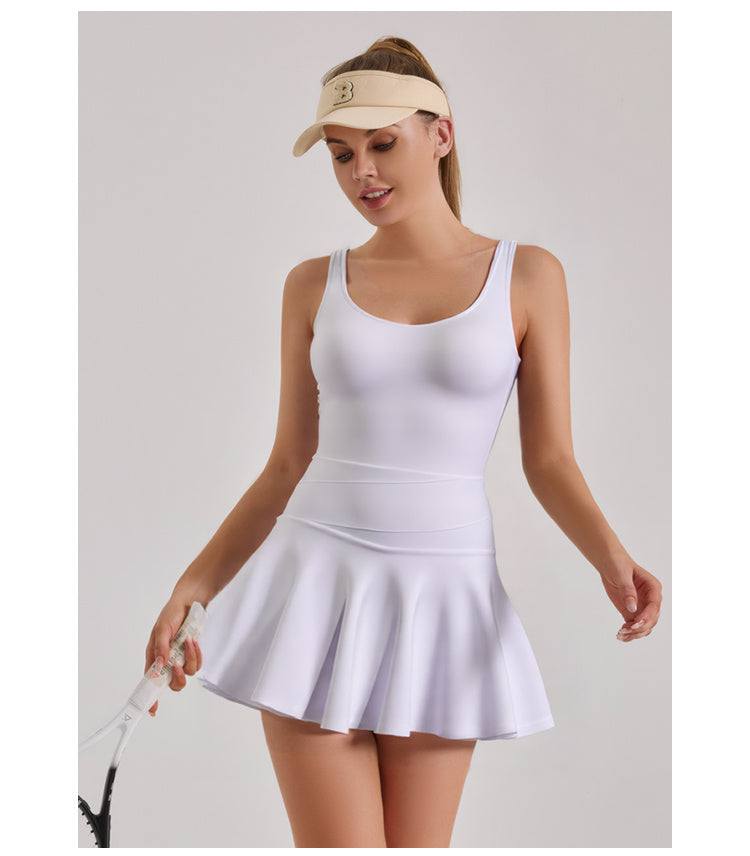 woman wearing white hoge stretch athletic dress holding tennis racket