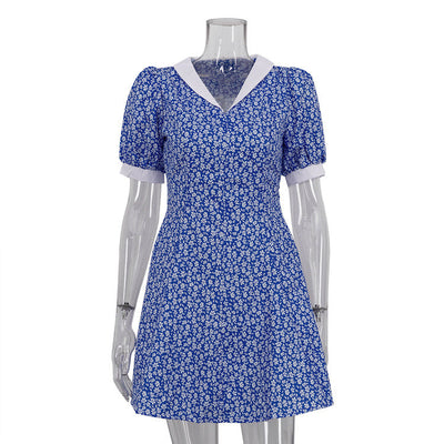 Blauwe bloemenjurk met hoge taille en revers Nexora Store