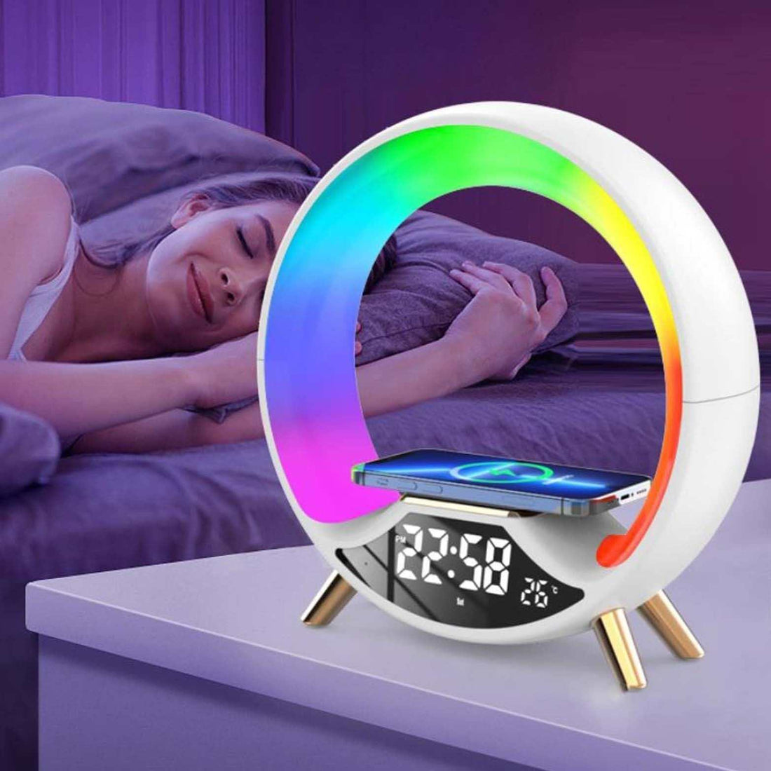 Wireless charging multifunctional Bluetooth speaker night light with colorful LED ring and digital clock display on bedside table