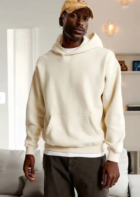 casual damestop met zakken beige capuchontrui met lange lantaarnmouwen en voorkant zakken