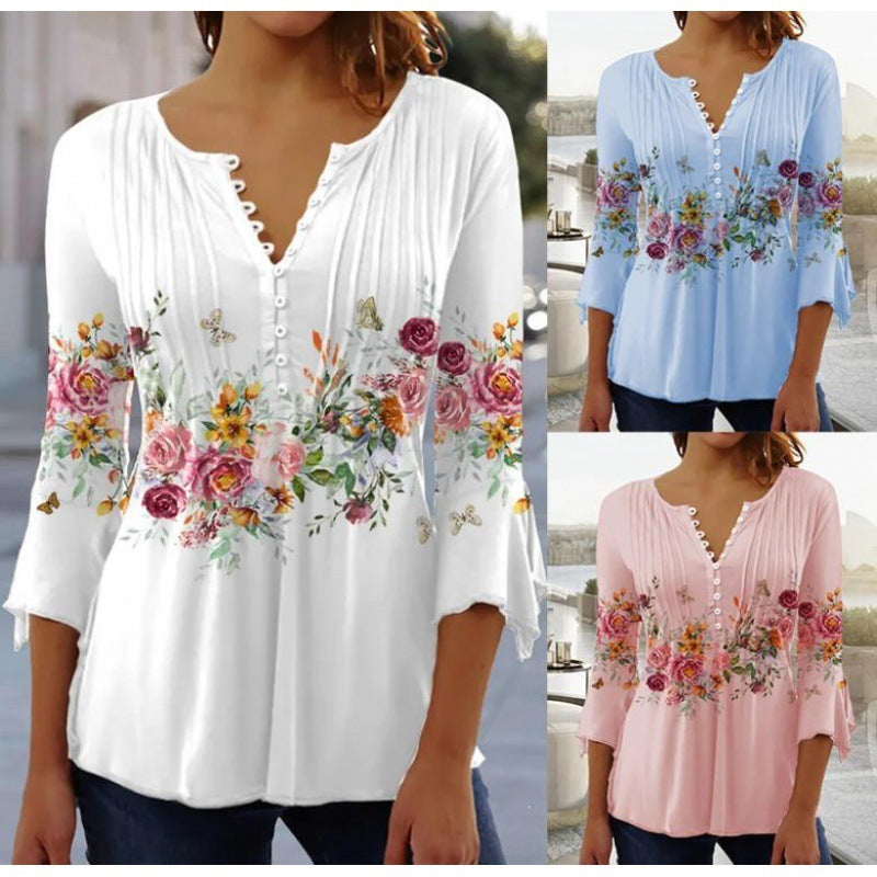 Modieus nieuw dames T-shirt met bloemenprint, V-hals en driekwartmouwen in wit, blauw en roze kleuren