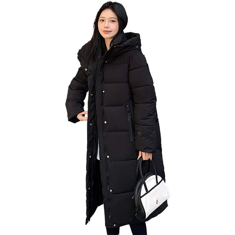 Women wearing white cold-proof cotton-padded jacket with hood outdoors