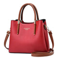 Red PU big bag with brown handles and shoulder strap, square vertical shape, zipper closure, soft surface, medium hardness, solid color handbag