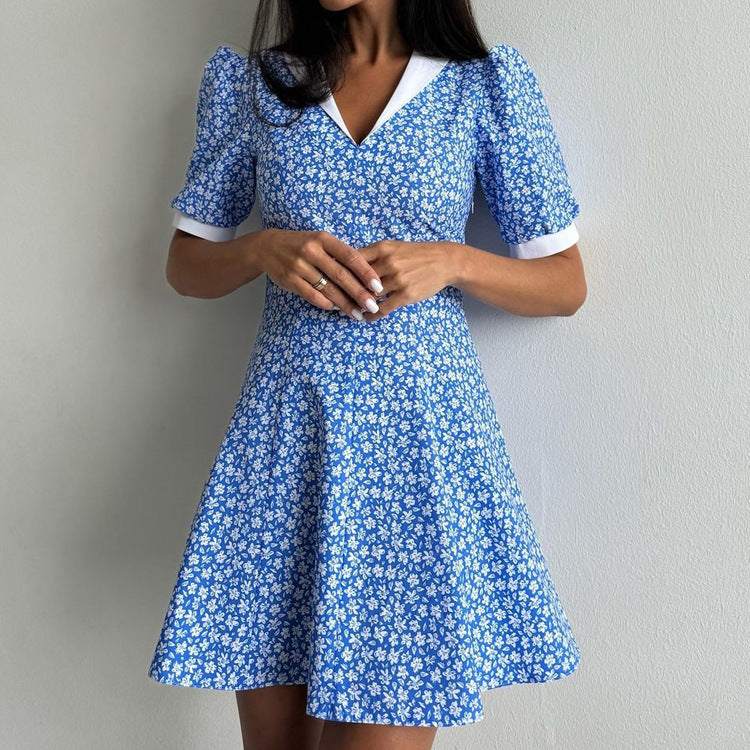 Blauwe bloemenjurk met hoge taille en revers Nexora Store