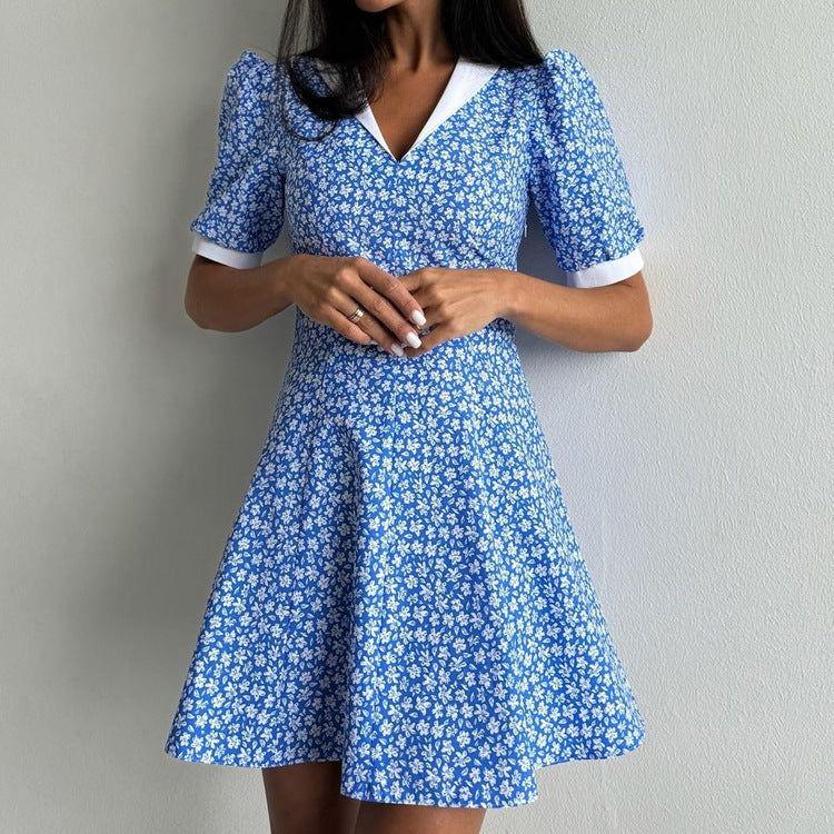 Blauwe bloemenjurk met hoge taille en revers Nexora Store
