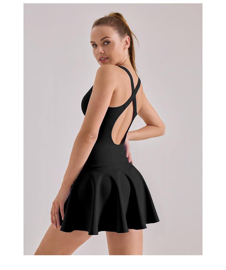 Woman wearing black dress made of Hoge Stretch fabric with open back and flared skirt