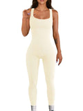 Dames tanktop met jarretels van spandex, strakke pasvorm en lange mouwen, crème kleurige lichaamsstrakke jumpsuit.