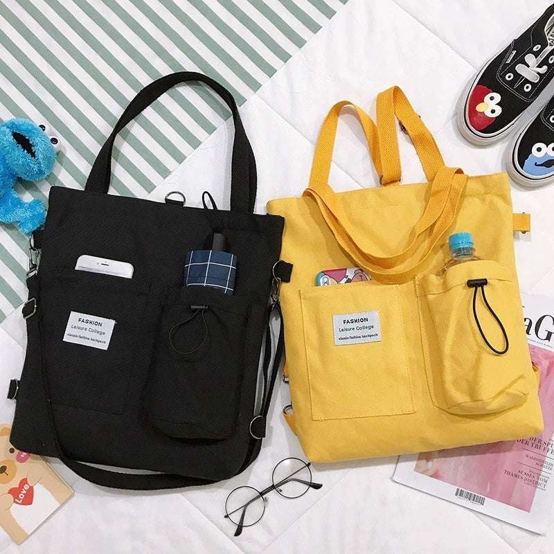 Trendy Harajuku canvas tote bags in black and yellow with multiple pockets and stylish Korean design