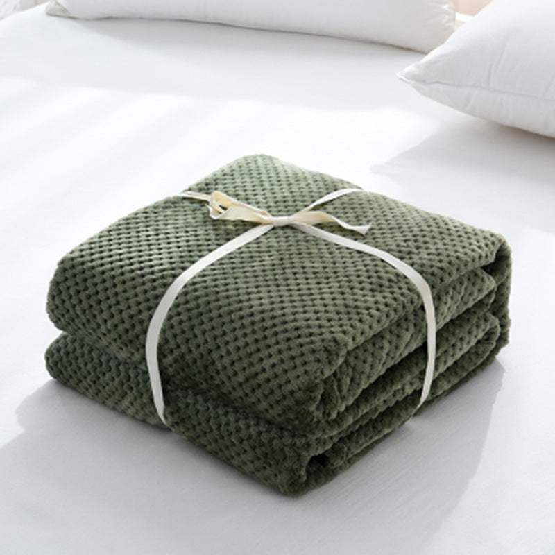 Household simple solid color coral fleece blankets in various colors, neatly folded with ribbons