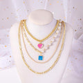 Gold multi-layer chunky chain pearl necklace with enamel smiley face charms for women