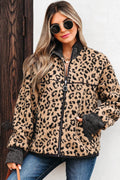 Woman wearing Sloane Leopard Zip Up fleece jacket with ribbed knit patches and front pockets