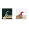 Zwart en rood Fidget Spinner speelgoed sleutelhanger van kunststof en zinklegering voor stressvermindering en concentratieverbetering.