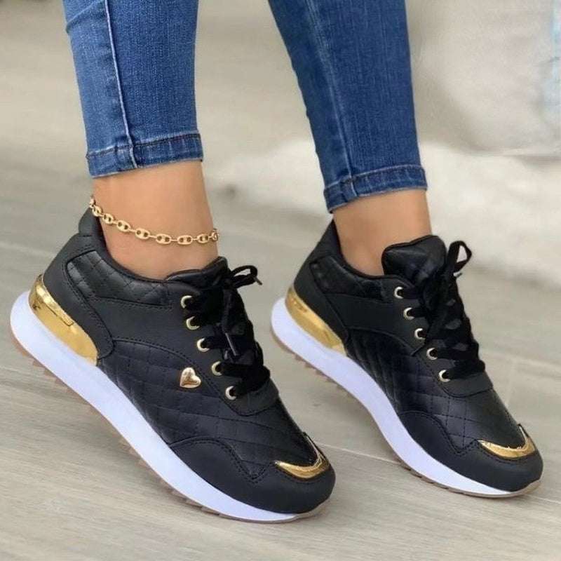 Dames geruite sneakers zwart met patchwork en gouden details, comfortabele sportschoenen met lage hak en striksluiting